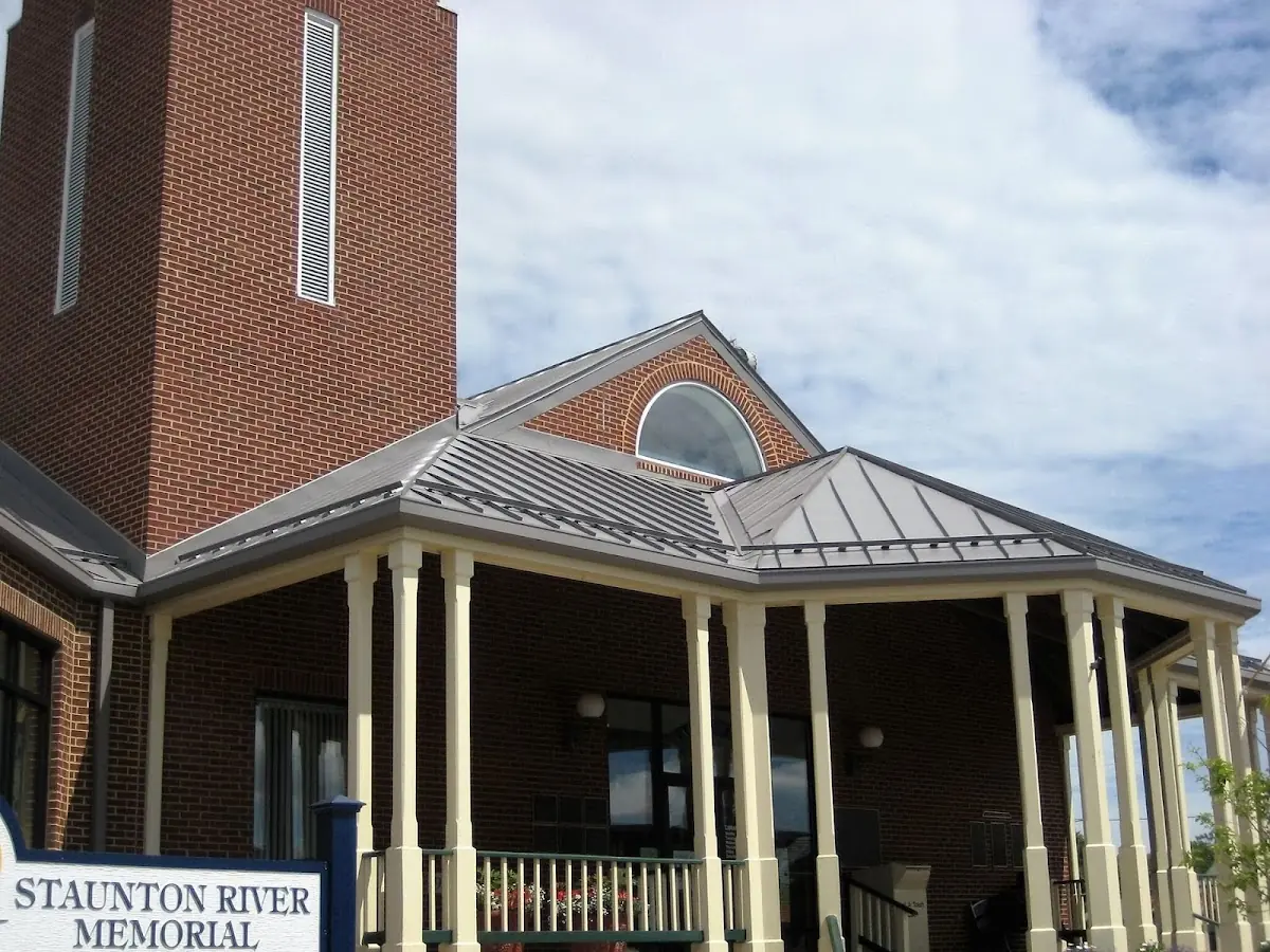 Skilled roofing craftsmen working on a residential roof in Rock Island